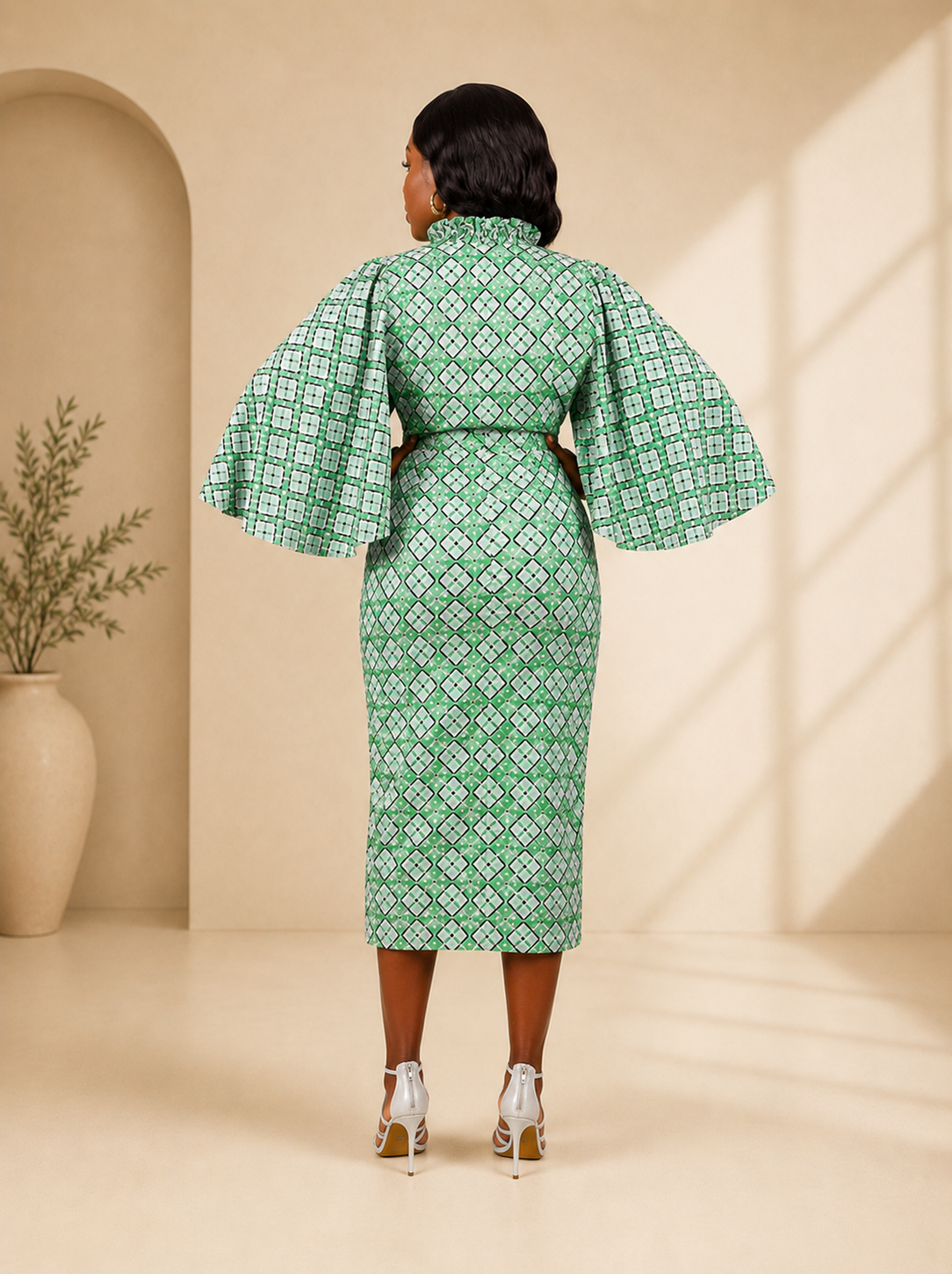 ELEVATED SLEEVE MIDI DRESS